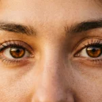 "metaphor for brown eyes"